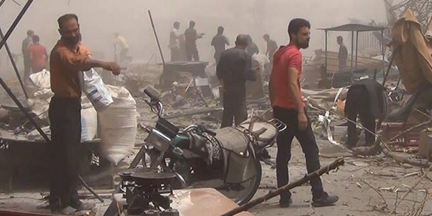 Suriye'de pazar yerine bombalı saldırı; 70 ölü