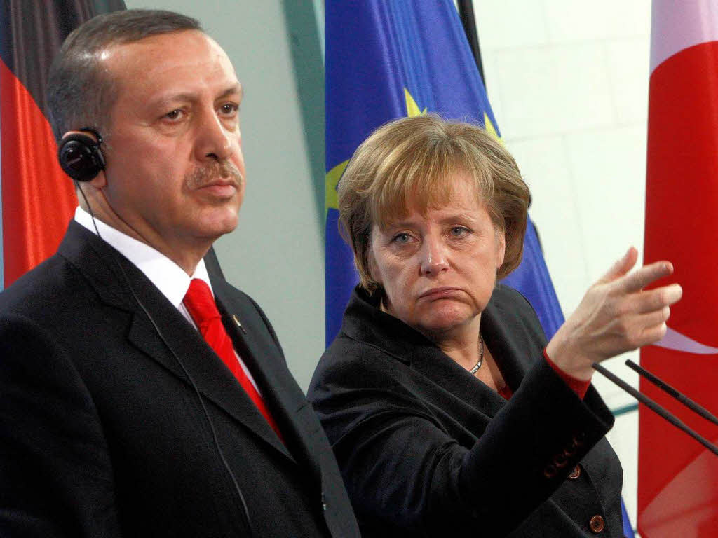Merkel'den Erdoğan'a 'itidal' çağrısı