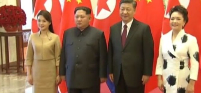 Kuzey Kore lideri Kim Jong-un Çin'i eşi ile birlikte ziyaret etti.