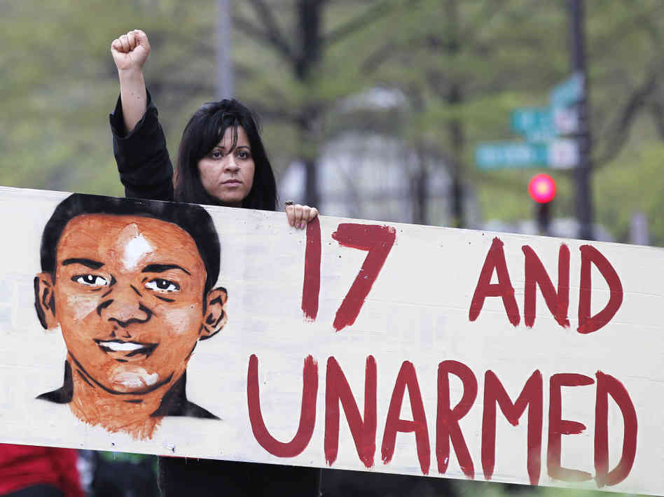 ABD'de yüz binler öldürülen siyah genç için yürüdü