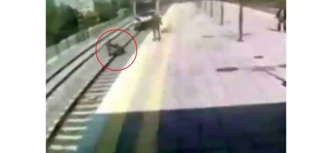 İstanbul'da Trenin önüne atlayıp intihara kalkışan kadını kurtardı(video)