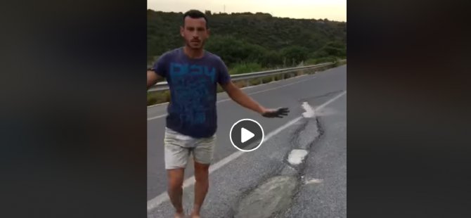 Dipkarpazlı vatandaş bozuk yola asfalt yama yaptı! (Video)