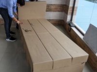 Hindistan'da Covid-19'a karşı karton yatak çözümü