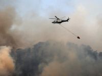 Kıbrıs'ın güneyinde çıkan yangına yardım için gelen helikopterlerden para istendi!