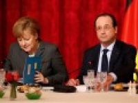 Hollande ve Merkel'den Ukrayna’ya yaptırım talebi