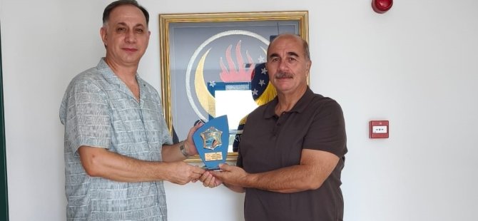 Nasıroğlu’ndan Gündoğdu’ya plaket