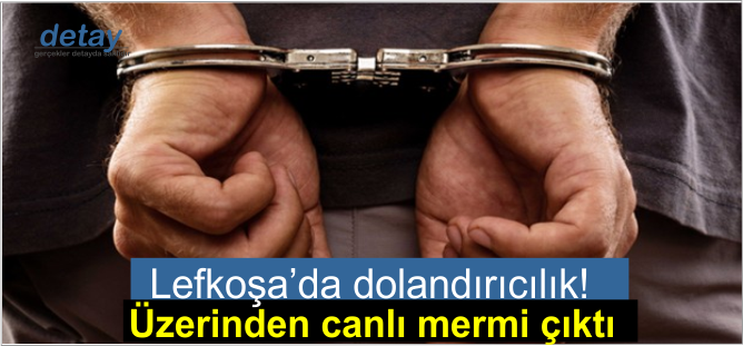 Tutuklanan dolandırıcının üzerinden mermi çıktı!