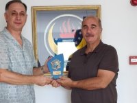 Nasıroğlu’ndan Gündoğdu’ya plaket