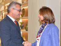 Erhürman, Holguin ile bir araya gelecek