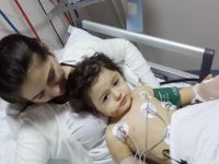 Çocuğunun peşinden balkondan atlamıştı