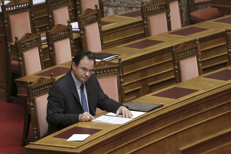 Greece's former Finance minister George Papaconstantinou attends a parliament session in Athens