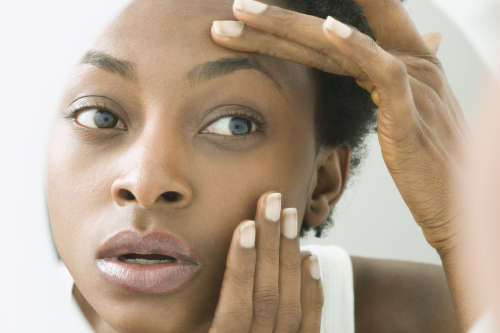 Reflection of woman in mirror